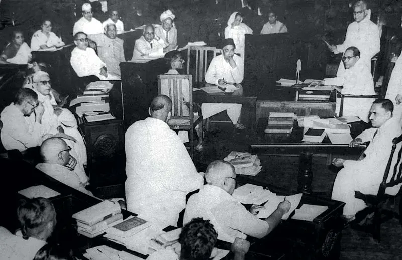 The Constituent Assembly of India in session in 1950, members seated in curved rows in a domed chamber.