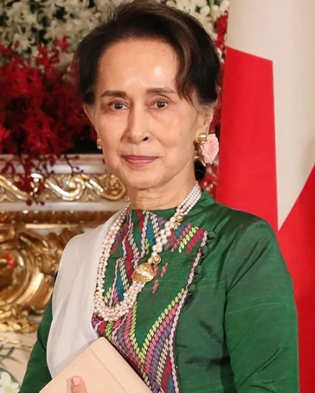 Photograph of Aung San Suu Kyi in traditional dress.