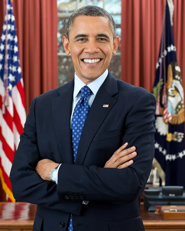 Official presidential portrait of Barack Obama in a dark suit and blue tie.