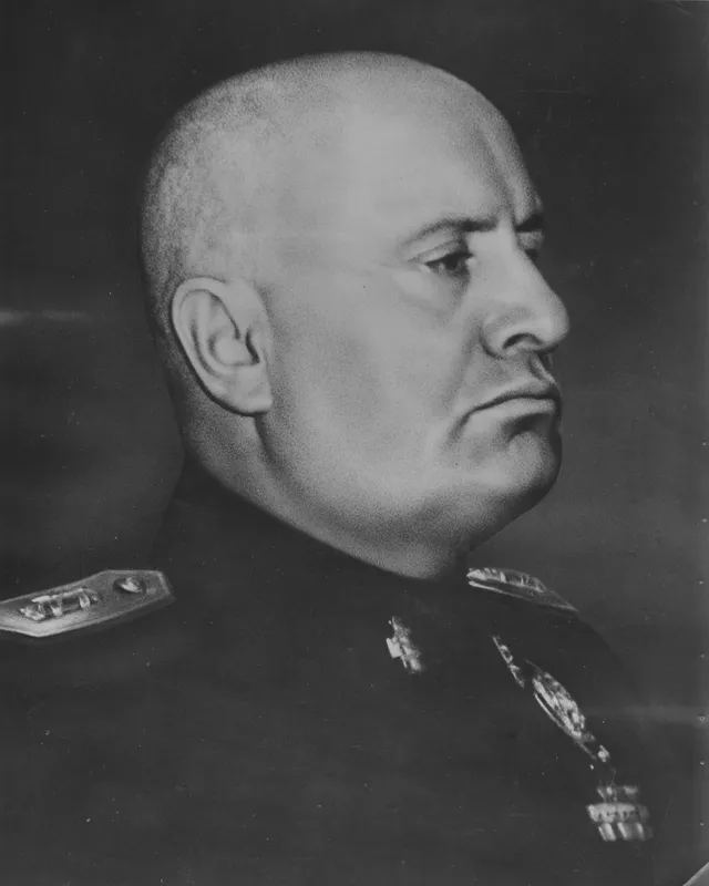 Portrait photograph of Benito Mussolini in uniform.