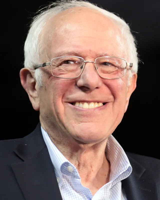 Photograph of Bernie Sanders speaking, in a dark suit, in March 2020.