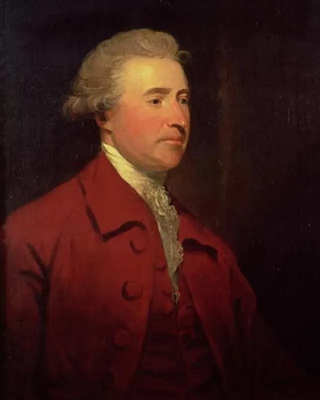 Painted portrait of Edmund Burke in a powdered wig and dark coat.