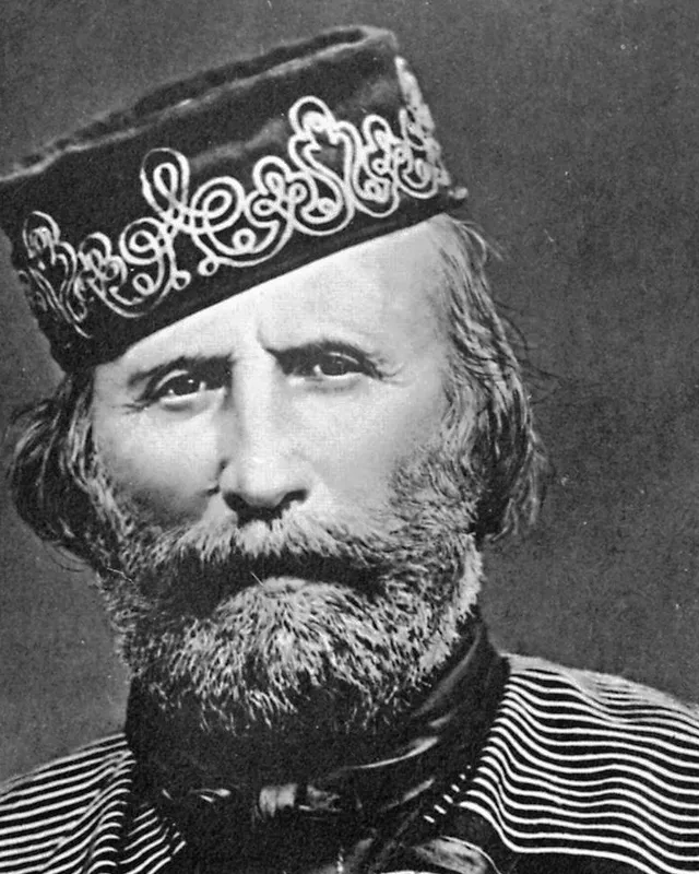 Photographic portrait of Giuseppe Garibaldi with a beard and poncho, 1866.