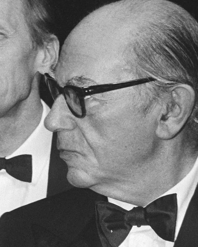 Photograph of Isaiah Berlin in evening dress, 1983.