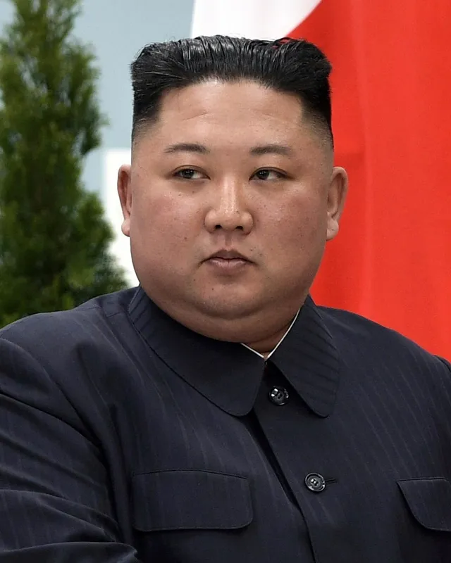 Photograph of Kim Jong-un in a dark suit, 2019.