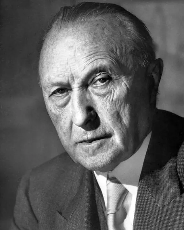 Photographic portrait of Konrad Adenauer.