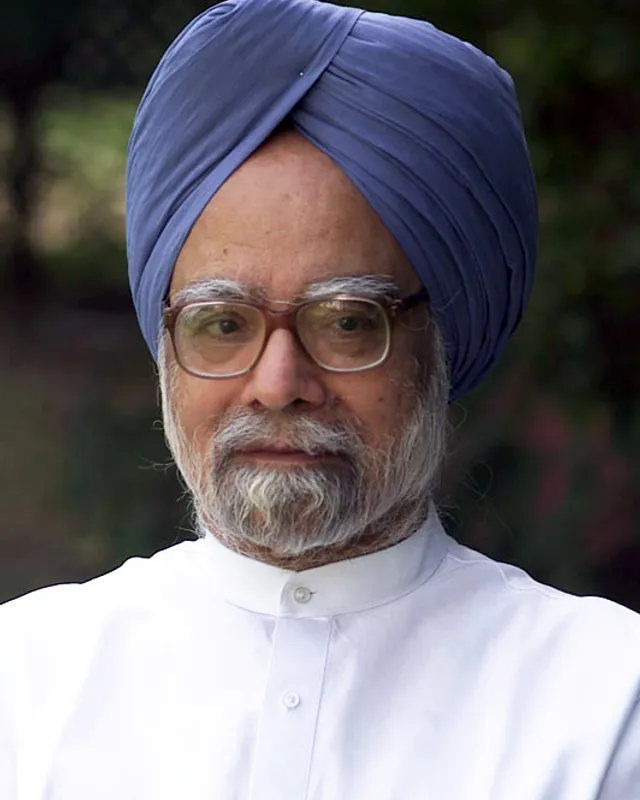 Official portrait of Prime Minister Manmohan Singh in a blue turban.