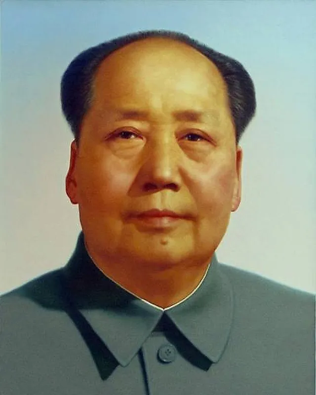 Portrait photograph of Mao Zedong in a buttoned tunic.
