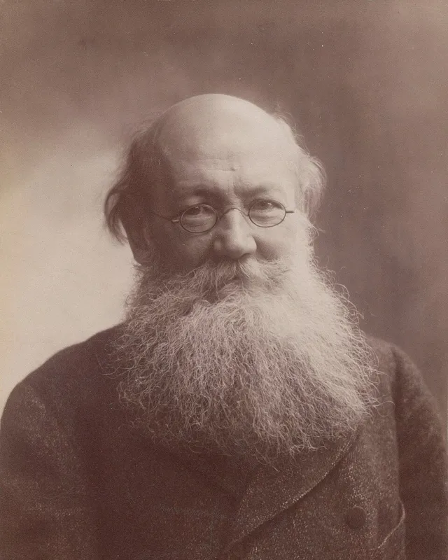 Photographic portrait of Peter Kropotkin with a long white beard.