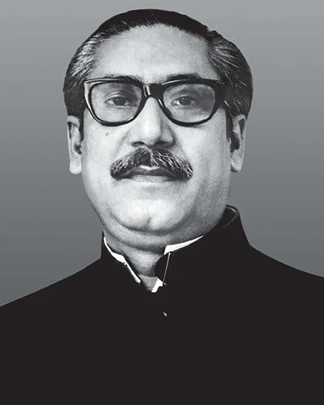 Official portrait of Sheikh Mujibur Rahman wearing glasses and a dark jacket.