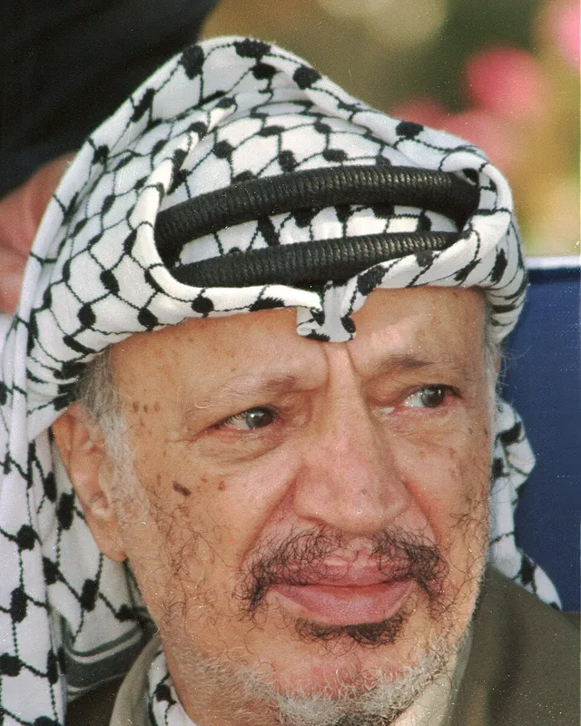 Photograph of Yasser Arafat wearing his keffiyeh, 1996.
